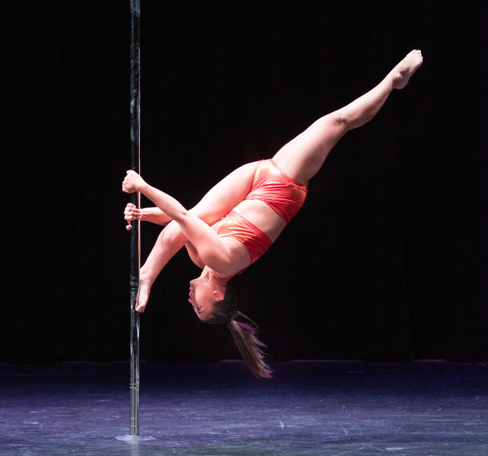 Russian split on a pole I'm upside down with one foot and both hands on a pole with my other leg extended in a Russian split